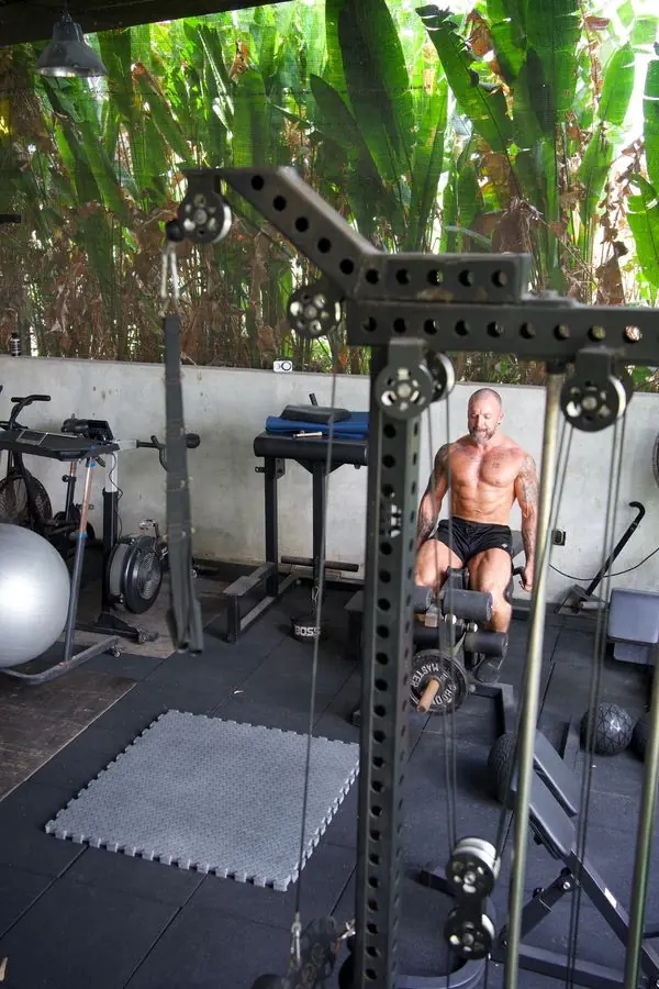 Coach Boltz training on the cable leg press